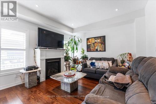 4444 Saw Mill Drive, Niagara Falls, ON - Indoor Photo Showing Living Room With Fireplace