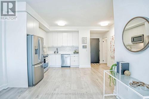 427 - 3200 William Coltson Avenue, Oakville, ON - Indoor Photo Showing Kitchen With Stainless Steel Kitchen