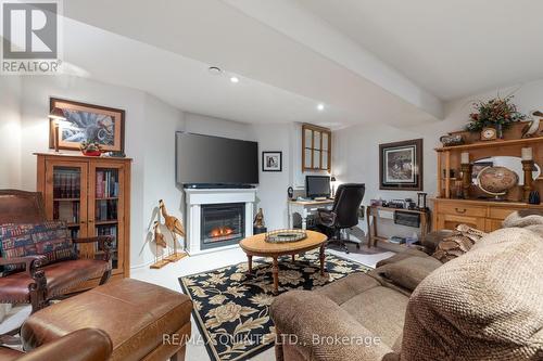 119 Bay Breeze Street, Prince Edward County (Ameliasburgh), ON - Indoor Photo Showing Living Room With Fireplace