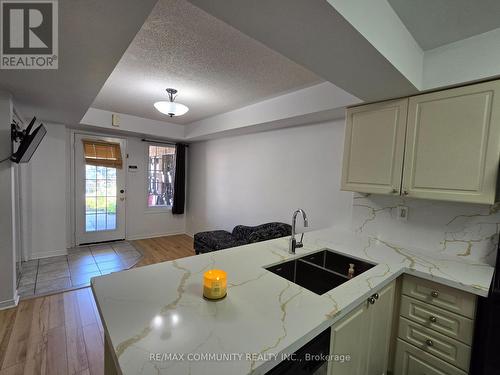 31 - 200 Mclevin Avenue, Toronto, ON - Indoor Photo Showing Kitchen With Double Sink