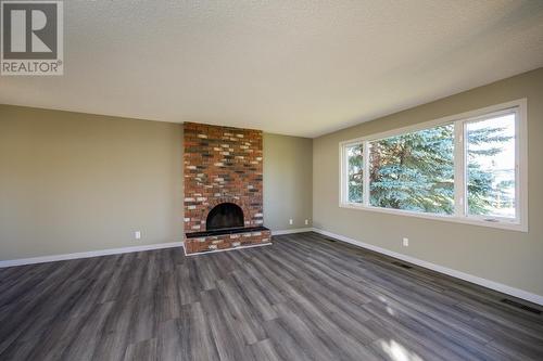 120 Parker Drive, Prince George, BC - Indoor Photo Showing Living Room With Fireplace