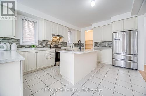 57 Michaelis Street, New Tecumseth, ON - Indoor Photo Showing Kitchen With Upgraded Kitchen