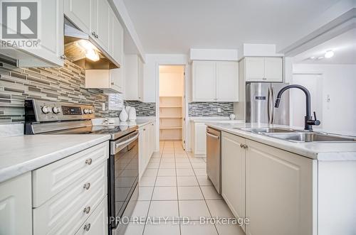 57 Michaelis Street, New Tecumseth, ON - Indoor Photo Showing Kitchen With Double Sink With Upgraded Kitchen