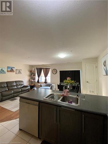 3200 Regional Road 56 Unit# 208, Binbrook, ON - Indoor Photo Showing Kitchen With Double Sink