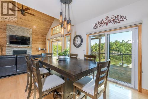 149 John Buchler Road, Georgian Bay, ON - Indoor Photo Showing Dining Room With Fireplace