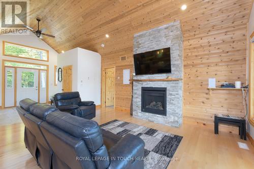 149 John Buchler Road, Georgian Bay, ON - Indoor Photo Showing Living Room With Fireplace