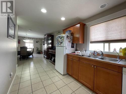 5008 46 Street, Fort Nelson, BC - Indoor Photo Showing Kitchen With Double Sink