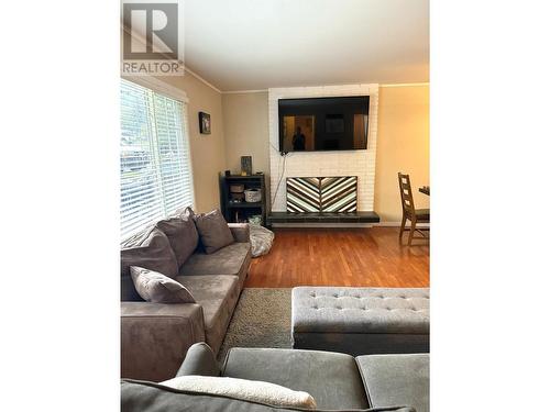 2611 Alpine Drive, Elkford, BC - Indoor Photo Showing Living Room With Fireplace