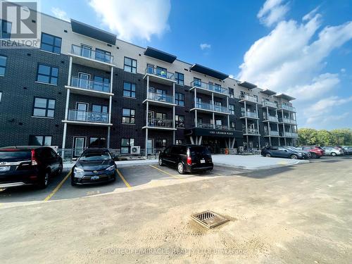 204 - 1101 Lackner Place, Kitchener, ON - Outdoor With Balcony With Facade