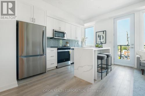 23 - 1455 O'Connor Drive, Toronto, ON - Indoor Photo Showing Kitchen