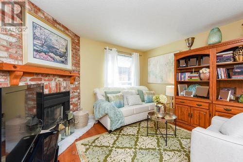 7 Muskoka Street E, Brampton, ON - Indoor Photo Showing Living Room With Fireplace