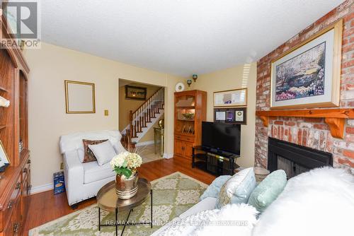 7 Muskoka Street E, Brampton, ON - Indoor Photo Showing Living Room With Fireplace