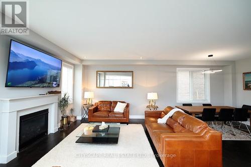 28 Celano Drive, Hamilton, ON - Indoor Photo Showing Living Room With Fireplace