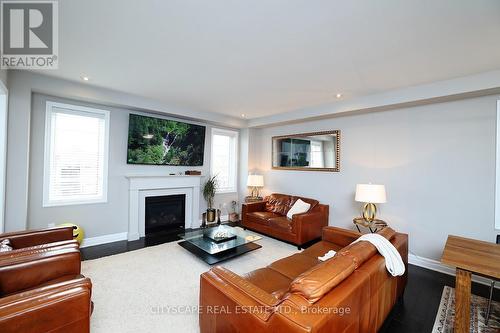 28 Celano Drive, Hamilton, ON - Indoor Photo Showing Living Room With Fireplace