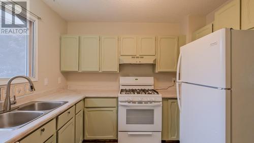 10713 Julia Street, Summerland, BC - Indoor Photo Showing Kitchen With Double Sink