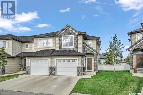 323 410 Ledingham Way, Saskatoon, SK - Outdoor With Facade