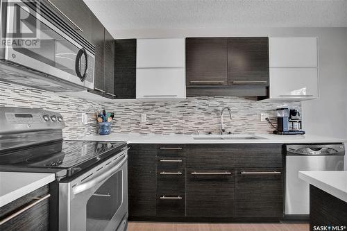 323 410 Ledingham Way, Saskatoon, SK - Indoor Photo Showing Kitchen With Double Sink With Upgraded Kitchen