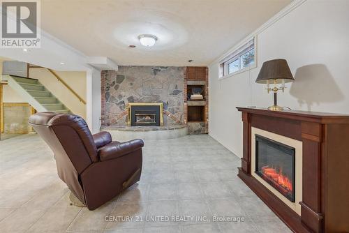 820 Clinton Avenue, Douro-Dummer, ON - Indoor Photo Showing Living Room With Fireplace