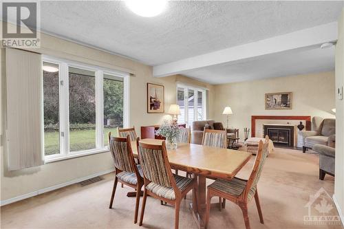 15 Dunvegan Road, Ottawa, ON - Indoor Photo Showing Dining Room With Fireplace