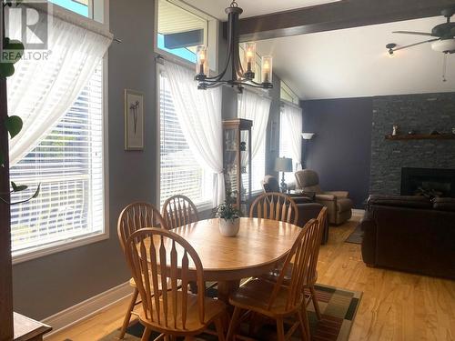 2849 Laburnum  Drive, Trail, BC - Indoor Photo Showing Dining Room With Fireplace