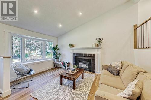 206 Burns Circle, Barrie, ON - Indoor Photo Showing Living Room With Fireplace