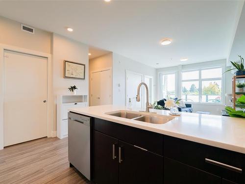 202-525 Third St, Nanaimo, BC - Indoor Photo Showing Kitchen With Double Sink