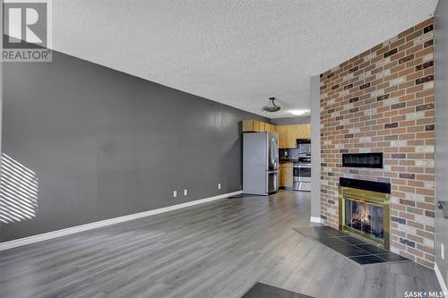 22 Cedar Meadow Drive, Regina, SK - Indoor With Fireplace