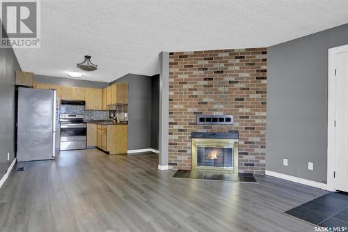 22 Cedar Meadow Drive, Regina, SK - Indoor With Fireplace