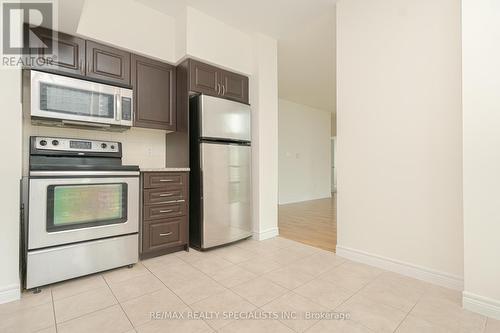 608 - 208 Enfield Place, Mississauga, ON - Indoor Photo Showing Kitchen With Stainless Steel Kitchen