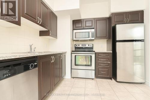 608 - 208 Enfield Place, Mississauga, ON - Indoor Photo Showing Kitchen With Stainless Steel Kitchen