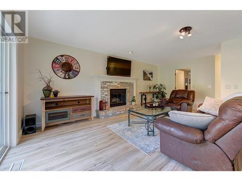 2935 Shannon Green Court, West Kelowna, BC - Indoor Photo Showing Living Room With Fireplace