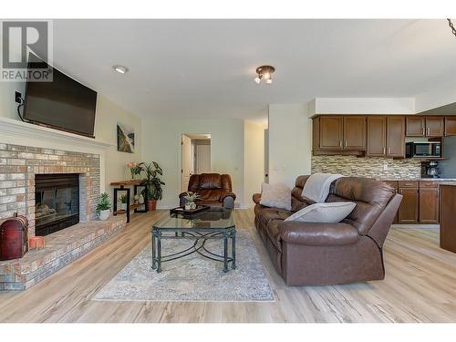 2935 Shannon Green Court, West Kelowna, BC - Indoor Photo Showing Living Room With Fireplace