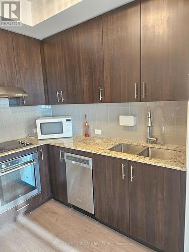 Ph05 - 255 Village Green Square, Toronto, ON - Indoor Photo Showing Kitchen With Double Sink With Upgraded Kitchen