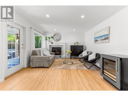 1137 Windermere Court, Kelowna, BC - Indoor Photo Showing Living Room With Fireplace