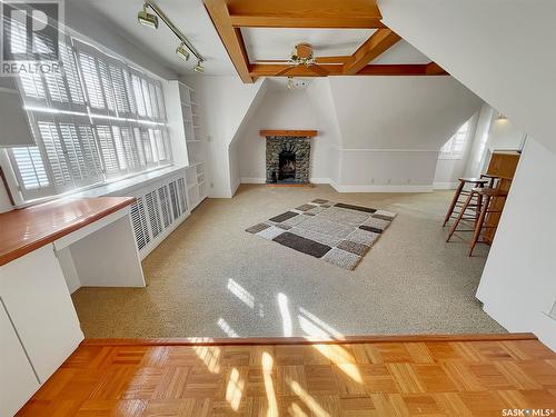 460 4Th Avenue Ne, Swift Current, SK - Indoor Photo Showing Other Room With Fireplace