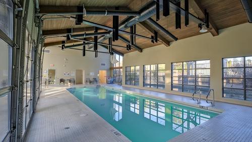 202-600 Sarsons Road, Kelowna, BC - Indoor Photo Showing Other Room With In Ground Pool