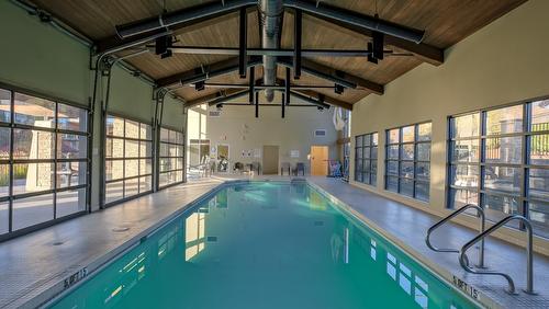 202-600 Sarsons Road, Kelowna, BC - Indoor Photo Showing Other Room With In Ground Pool