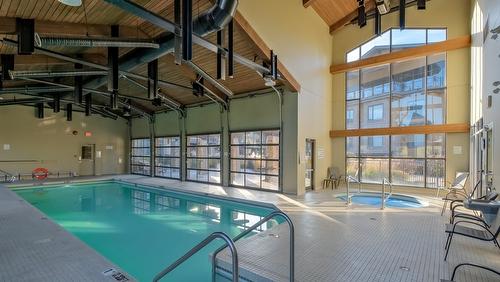 202-600 Sarsons Road, Kelowna, BC - Indoor Photo Showing Other Room With In Ground Pool