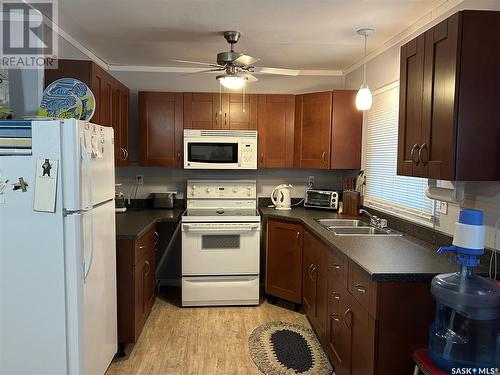 1100 Lakeside Road, Marean Lake, SK - Indoor Photo Showing Kitchen With Double Sink