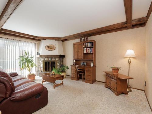 Family room - 118 Rue Acres, Kirkland, QC - Indoor With Fireplace