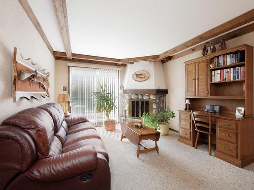 Family room - 118 Rue Acres, Kirkland, QC - Indoor With Fireplace