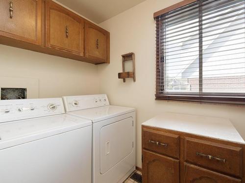 Laundry room - 118 Rue Acres, Kirkland, QC - Indoor Photo Showing Laundry Room