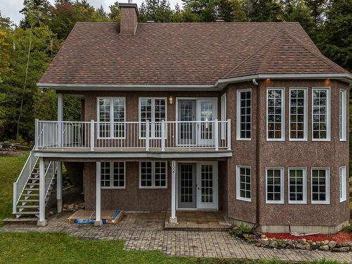 Aerial photo - 132 Ch. Fournel, Sainte-Anne-Des-Lacs, QC - Outdoor With Deck Patio Veranda