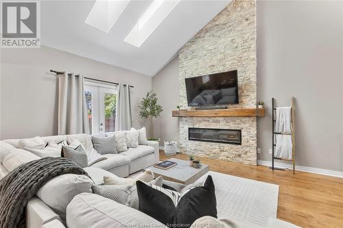 4237 Pearleaf Court, Windsor, ON - Indoor Photo Showing Living Room With Fireplace