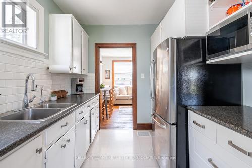 69 East Park Drive, Woodstock, ON - Indoor Photo Showing Kitchen With Double Sink