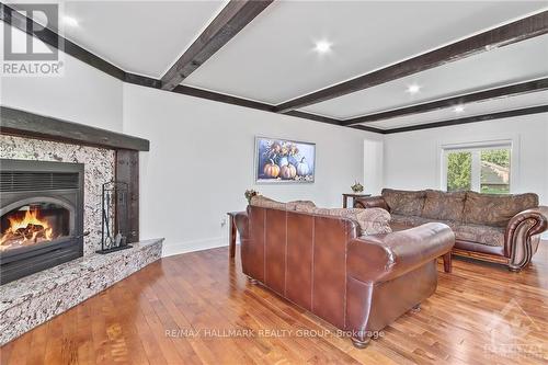 804 Flynn Road, North Grenville, ON - Indoor Photo Showing Living Room With Fireplace