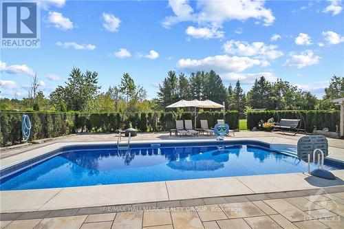 804 Flynn Road, North Grenville, ON - Outdoor With In Ground Pool With Backyard