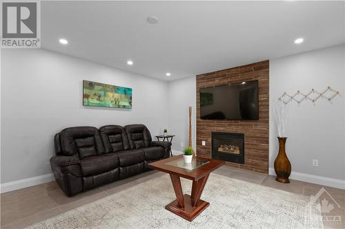 1609 Bottriell Way, Ottawa, ON - Indoor Photo Showing Living Room With Fireplace