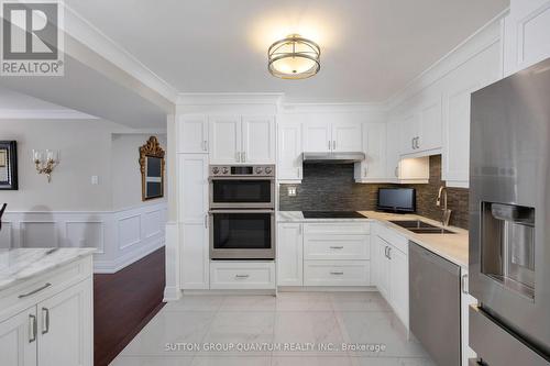 201 - 1400 Dixie Road, Mississauga, ON - Indoor Photo Showing Kitchen With Double Sink