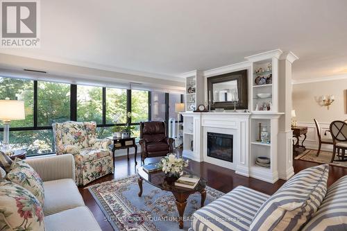 201 - 1400 Dixie Road, Mississauga, ON - Indoor Photo Showing Living Room With Fireplace